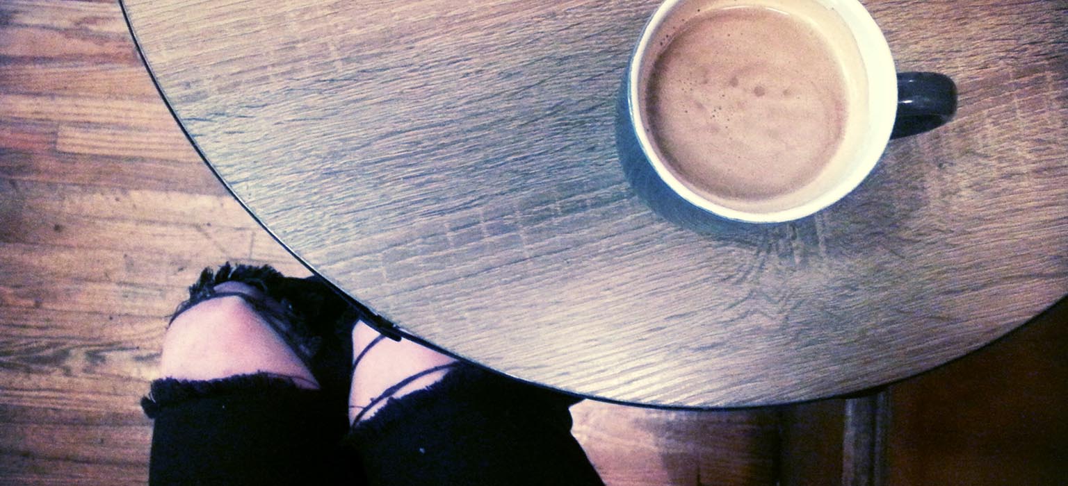 Table with coffee cup